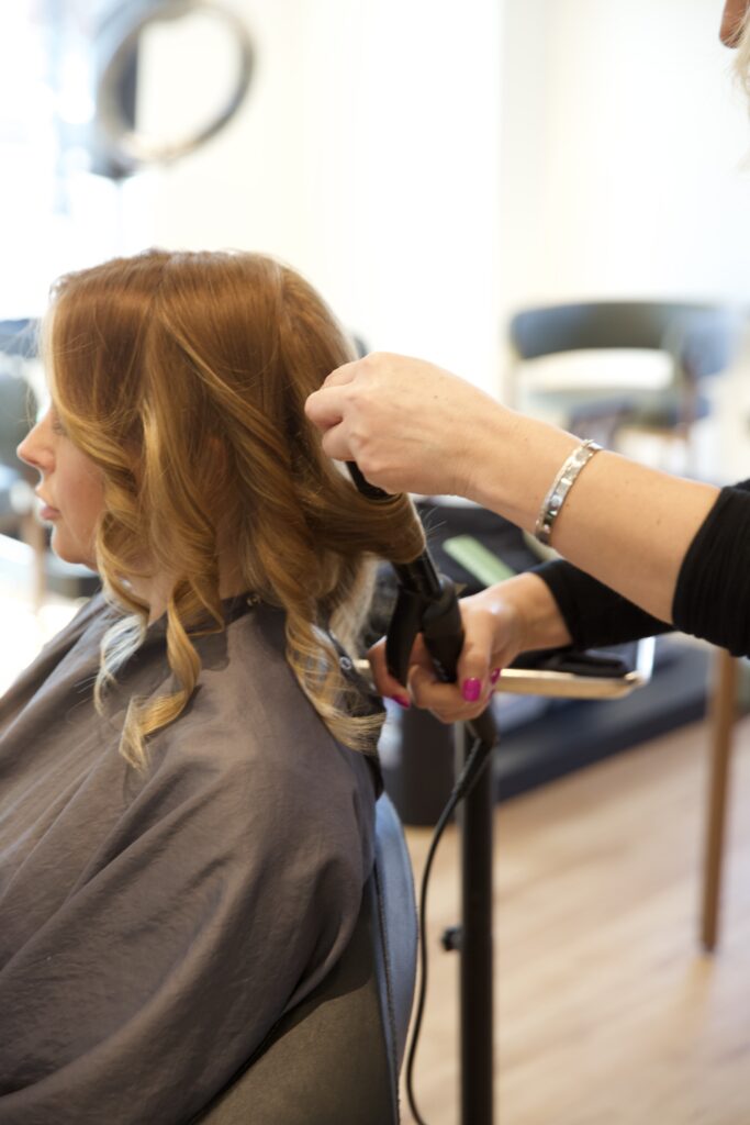 Dimensional copper hair color with high shine at Vakkar Salon, St. Louis